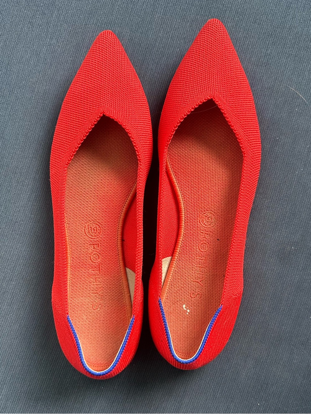 Rothy’s pointed toe flat cherry red